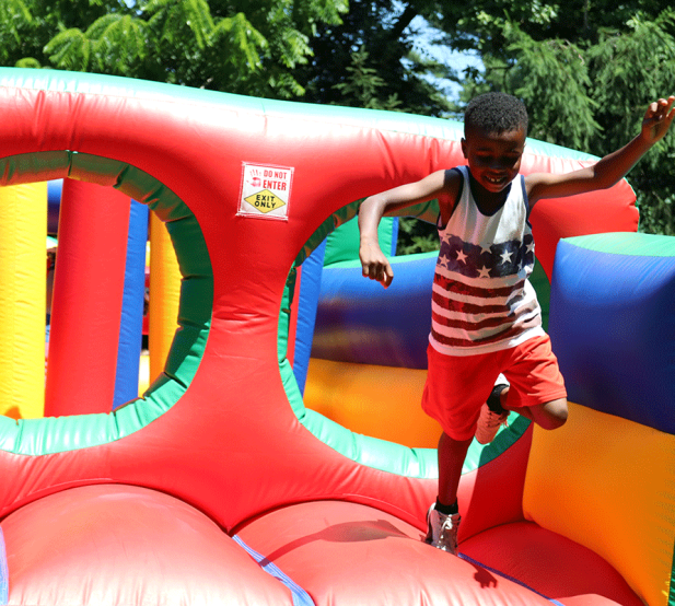 Child playing on inflatable